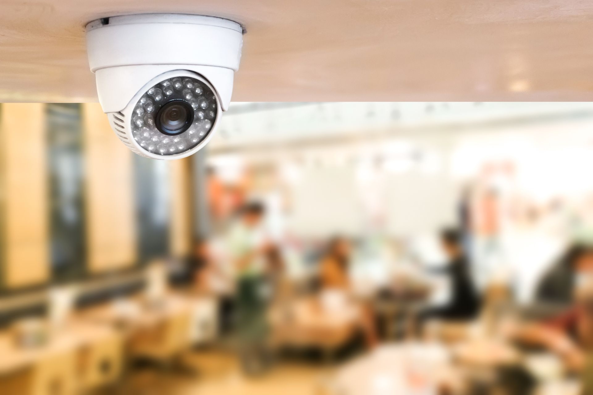 How do hospitality lobby entrance cameras help in managing visitor traffic flow?